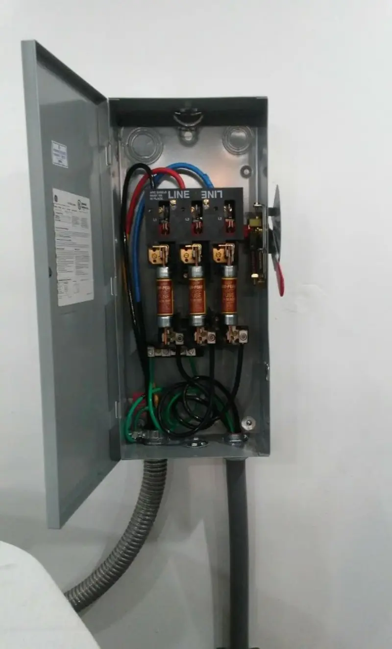 Three-phase disconnect switch installed for Smoke Detector Installation in Holt