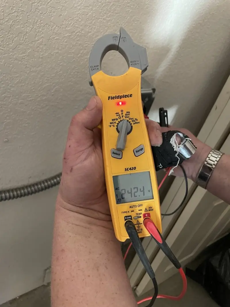 Voltage testing with clamp meter during Circuit Breaker Repair in Holt